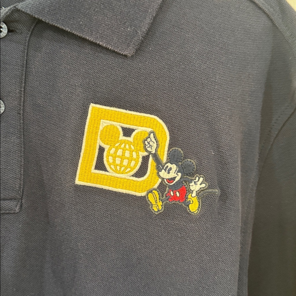 NWT Disney Men's Dark Blue Polo Shirt with Mickey 71 Patch - Picture 2 of 6